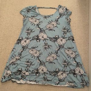 Short dress with flowers and back cut out.